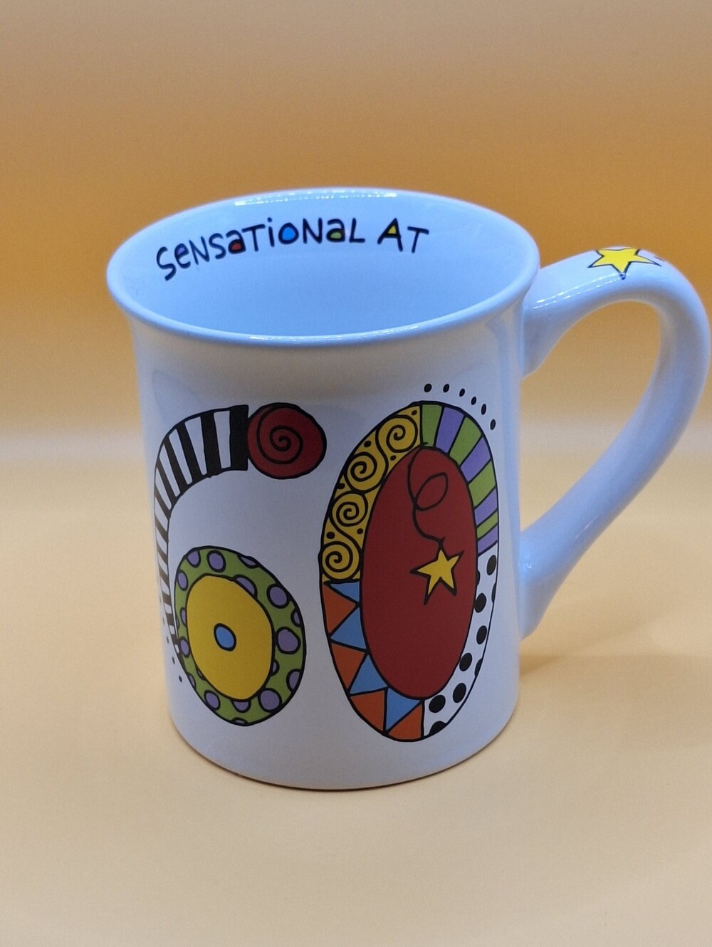 Celebrating 60 Years Cup. Sensational At 60 Cup with Colorful Graphics.